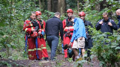Peer support firefighters engaging in the program in the woods