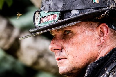 Closeup of a fire fighters face covered in ash