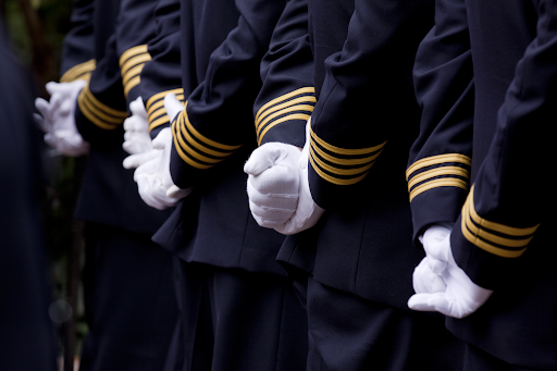 Firefighters in black uniforms dealing with survivors guilt