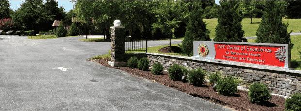 Welcome sign view from outside the front of the building