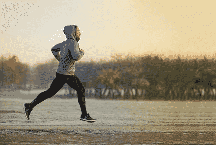 Fire fighter running outside during sunrise in order to take care of his mental health