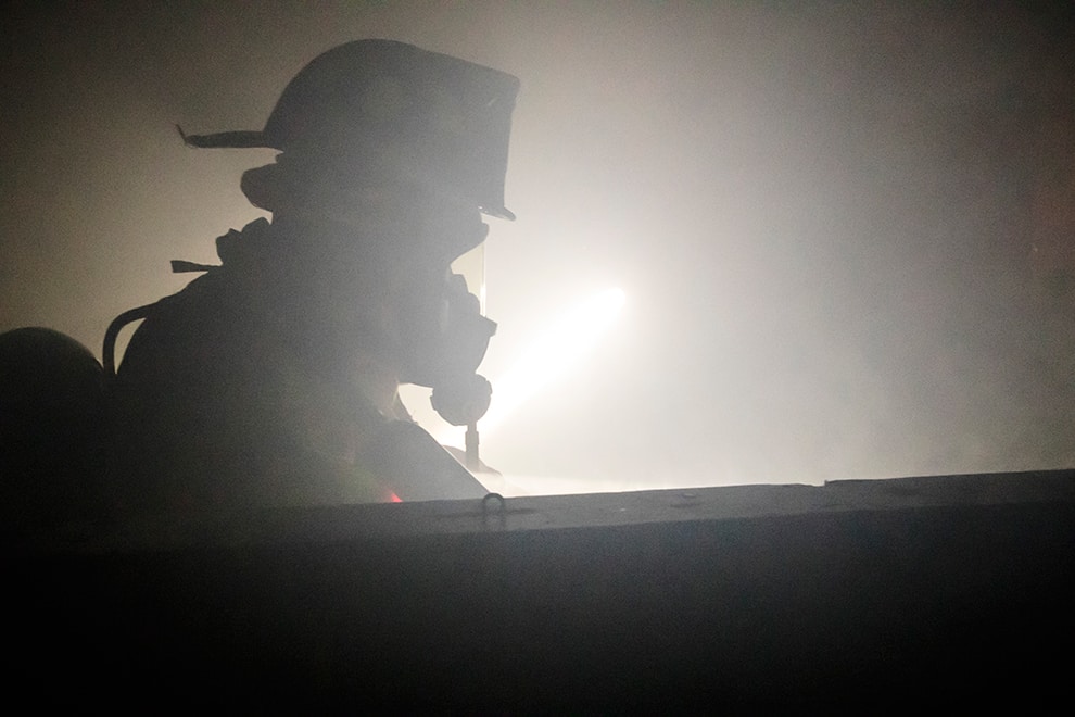 Silhouette of a fire fighter