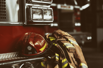 helmet and fire fighter jacket on truck